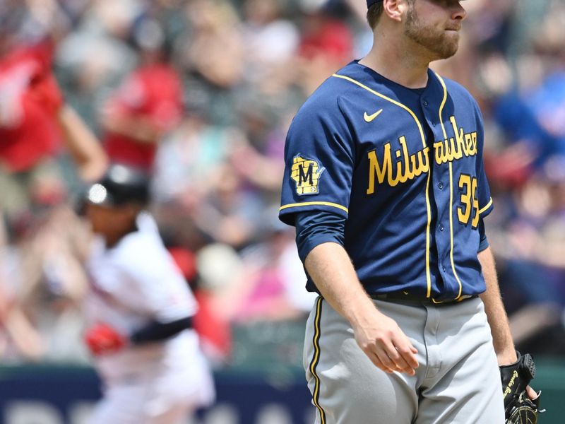 Jun 25, 2023; Cleveland, Ohio, USA; \Milwaukee Brewers starting pitcher Corbin Burnes (39) reacts as Cleveland Guardians first baseman Josh Naylor (22) rounds the bases after hitting a home run during the second inning at Progressive Field. Mandatory Credit: Ken Blaze-USA TODAY Sports