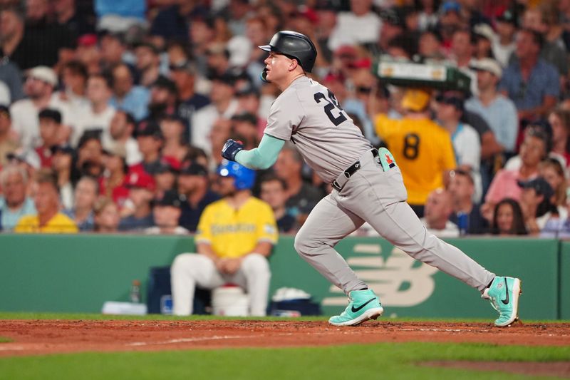 Jul 27, 2024; Boston, Massachusetts, USA; New York Yankees right fielder Alex Verdugo (24) hits a double against the Boston Red Sox during the fifth inning at Fenway Park. Mandatory Credit: Gregory Fisher-USA TODAY Sports