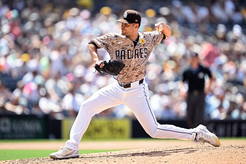 Jun 23, 2024; San Diego, California, USA; San Diego Padres relief pitcher Tom Cosgrove (59) pitches against the Milwaukee Brewers during the seventh inning at Petco Park. Mandatory Credit: Orlando Ramirez-USA TODAY Sports