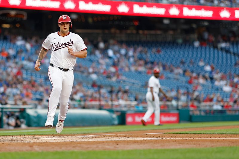 Jun 3, 2024; Washington, District of Columbia, USA; Washington Nationals third base Nick Senzel (13) scores a run on an RBI single by Nationals outfielder Jesse Winker (not pictured) against the New York Mets during the second inning at Nationals Park. Mandatory Credit: Geoff Burke-USA TODAY Sports