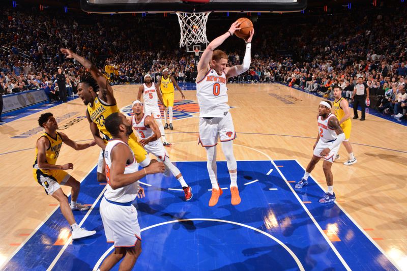 NEW YORK, NY - MAY 19: Donte Divincenzo #0 of the New York Knicks rebounds the ball during the game against the Indiana Pacers during Round 2 Game 7 of the 2024 NBA Playoffs on May 19, 2024 at Madison Square Garden in New York City, New York.  NOTE TO USER: User expressly acknowledges and agrees that, by downloading and or using this photograph, User is consenting to the terms and conditions of the Getty Images License Agreement. Mandatory Copyright Notice: Copyright 2024 NBAE  (Photo by Jesse D. Garrabrant/NBAE via Getty Images)