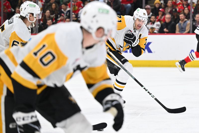 Feb 15, 2024; Chicago, Illinois, USA; Pittsburgh Penguins forward Evgeni Malkin (71) helps lead a rush up ice with the puck in the first period against the Chicago Blackhawks at United Center. Mandatory Credit: Jamie Sabau-USA TODAY Sports