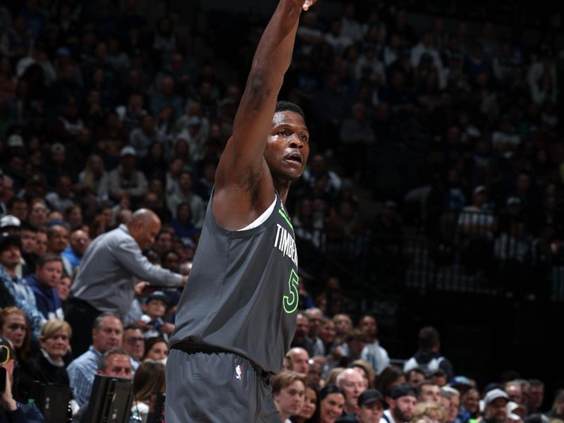 MINNEAPOLIS, MN -  NOVEMBER 1: Anthony Edwards #5 of the Minnesota Timberwolves looks on during the game against the Denver Nuggets on November 1, 2024 at Target Center in Minneapolis, Minnesota. NOTE TO USER: User expressly acknowledges and agrees that, by downloading and or using this Photograph, user is consenting to the terms and conditions of the Getty Images License Agreement. Mandatory Copyright Notice: Copyright 2024 NBAE (Photo by David Sherman/NBAE via Getty Images)