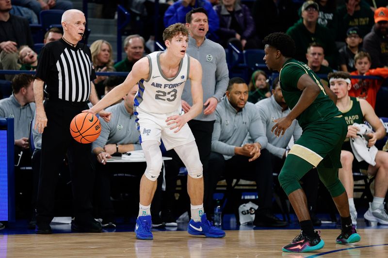 Mar 9, 2024; Colorado Springs, Colorado, USA; Air Force Falcons guard Kellan Boylan (23) controls the ball as Colorado State Rams guard Isaiah Stevens (4) guards in the first half at Clune Arena. Mandatory Credit: Isaiah J. Downing-USA TODAY Sports