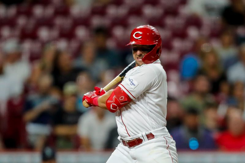 Sep 5, 2023; Cincinnati, Ohio, USA; Cincinnati Reds second baseman Spencer Steer (7) dodges a pitch against the Seattle Mariners in the seventh inning at Great American Ball Park. Mandatory Credit: Katie Stratman-USA TODAY Sports