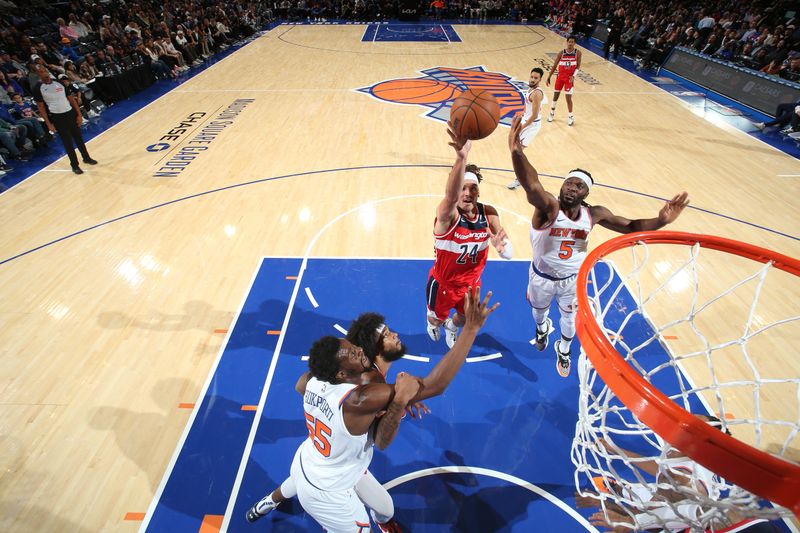 NEW YORK, NY - OCTOBER 9: Corey Kispert #24 of the Washington Wizards drives to the basket during the game against the New York Knicks during the 2024 NBA Preseason on October 9, 2024 at Madison Square Garden in New York City, New York.  NOTE TO USER: User expressly acknowledges and agrees that, by downloading and or using this photograph, User is consenting to the terms and conditions of the Getty Images License Agreement. Mandatory Copyright Notice: Copyright 2024 NBAE  (Photo by Nathaniel S. Butler/NBAE via Getty Images)