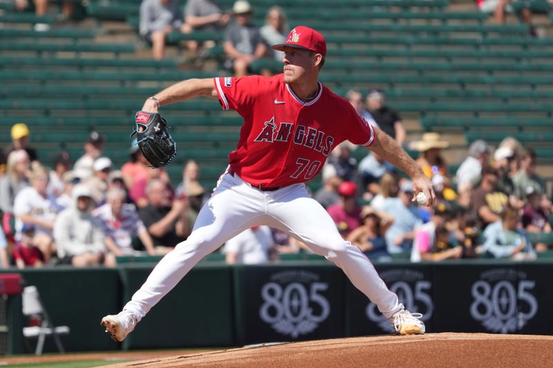 Mar 10, 2026; Tempe, Arizona, USA; Los Angeles Angels pitcher Mitch Farris (70) throws against the San Diego Padres in the first inning at Tempe Diablo Stadium. Mandatory Credit: Rick Scuteri-Imagn Images