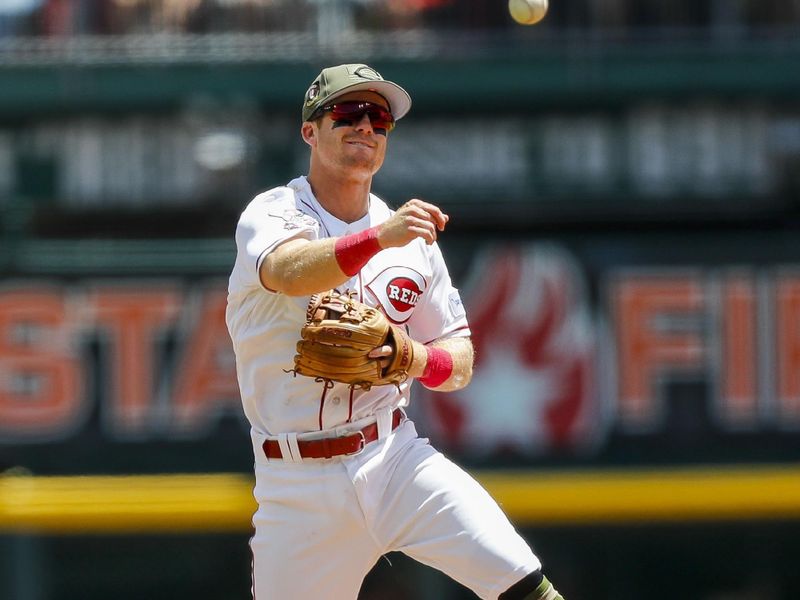 May 21, 2023; Cincinnati, Ohio, USA; Cincinnati Reds shortstop Matt McLain (9) throws to first to get New York Yankees second baseman Gleyber Torres (not pictured) out in the eighth inning at Great American Ball Park. Mandatory Credit: Katie Stratman-USA TODAY Sports