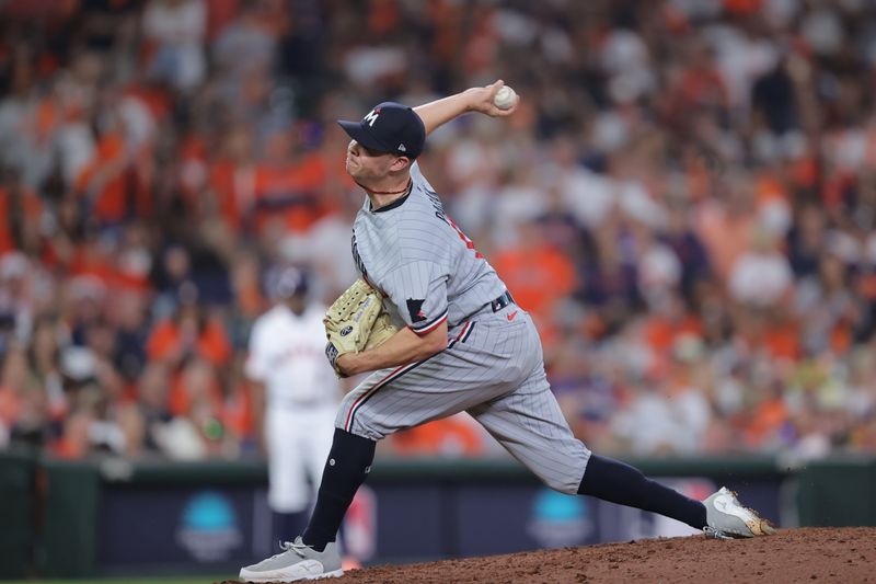 Oct 7, 2023; Houston, Texas, USA; Minnesota Twins relief pitcher Emilio Pagan (15) pitches in the eighth inning against the Houston Astros during game one of the ALDS for the 2023 MLB playoffs at Minute Maid Park. Mandatory Credit: Erik Williams-USA TODAY Sports