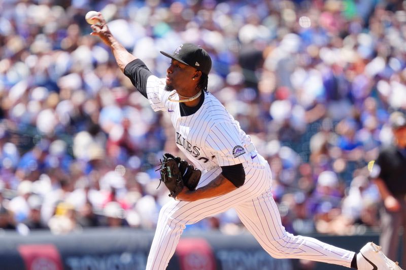 Jun 26, 2025; Denver, Colorado, USA; Colorado Rockies relief pitcher Angel Chivilli (57) delivers a pitch in the sixth inning against the Los Angeles Dodgers at Coors Field. Mandatory Credit: Ron Chenoy-Imagn Images