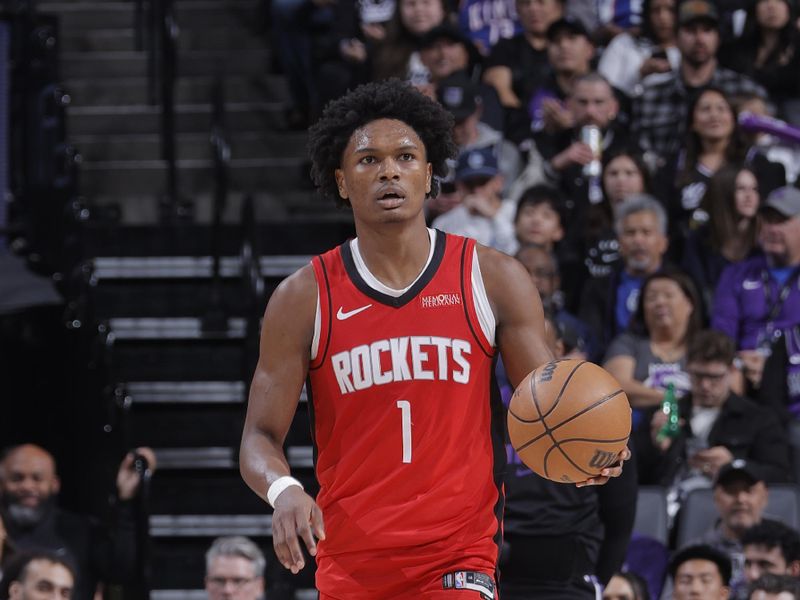 SACRAMENTO, CA - JANUARY 16: Amen Thompson #1 of the Houston Rockets dribbles the ball during the game against the Sacramento Kings on January 16, 2025 at Golden 1 Center in Sacramento, California. NOTE TO USER: User expressly acknowledges and agrees that, by downloading and or using this Photograph, user is consenting to the terms and conditions of the Getty Images License Agreement. Mandatory Copyright Notice: Copyright 2025 NBAE (Photo by Rocky Widner/NBAE via Getty Images)