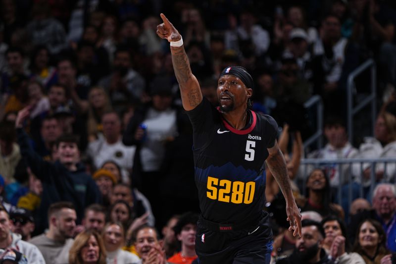 DENVER, CO - JANUARY 7: Kentavious Caldwell-Pope #5 of the Denver Nuggets looks on during the game against the Detroit Pistons on January 7, 2024 at the Ball Arena in Denver, Colorado. NOTE TO USER: User expressly acknowledges and agrees that, by downloading and/or using this Photograph, user is consenting to the terms and conditions of the Getty Images License Agreement. Mandatory Copyright Notice: Copyright 2024 NBAE (Photo by Garrett Ellwood/NBAE via Getty Images)