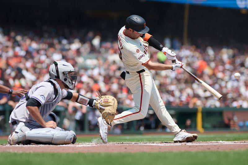 Jul 28, 2024; San Francisco, California, USA; San Francisco Giants infielder Casey Schmitt (10) hits a one run home run against the Colorado Rockies during the first inning at Oracle Park. Mandatory Credit: Robert Edwards-USA TODAY Sports