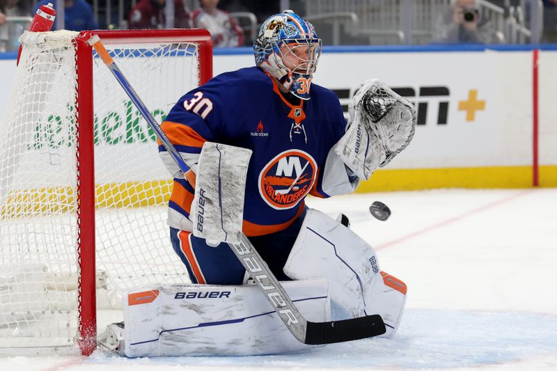 Jan 28, 2025; Elmont, New York, USA; New York Islanders goaltender Ilya Sorokin (30) makes a save against the Colorado Avalanche during the third period at UBS Arena. Mandatory Credit: Brad Penner-Imagn Images