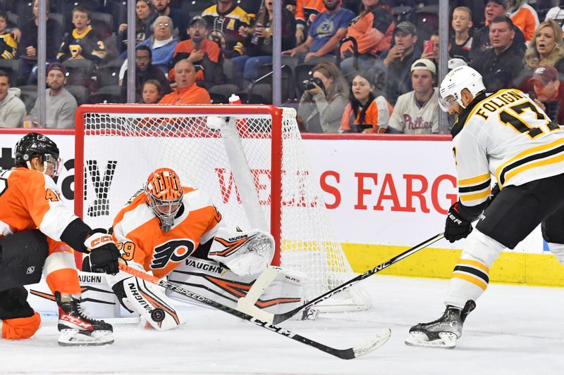 Sep 24, 2022; Philadelphia, Pennsylvania, USA; Philadelphia Flyers goaltender Troy Grosenick (29) makes a save against Boston Bruins left wing Nick Foligno (17) during the third period at Wells Fargo Center. Mandatory Credit: Eric Hartline-USA TODAY Sports