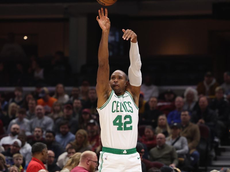 CLEVELAND, OH - DECEMBER 1: Al Horford #42 of the Boston Celtics shoots a three point basket during the game against the Boston Celtics on December 1, 2024 at Rocket Mortgage FieldHouse in Cleveland, Ohio. NOTE TO USER: User expressly acknowledges and agrees that, by downloading and/or using this Photograph, user is consenting to the terms and conditions of the Getty Images License Agreement. Mandatory Copyright Notice: Copyright 2024 NBAE (Photo by  Lauren Leigh Bacho/NBAE via Getty Images)