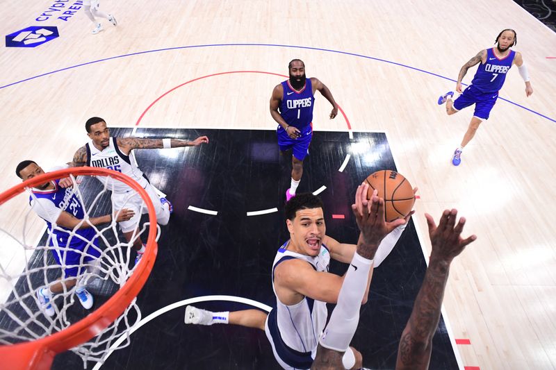 LOS ANGELES, CA - APRIL 21:  Josh Green #8 of the Dallas Mavericks drives to the basket during the game against the LA Clippers during Round 1 Game 1 of the 2024 NBA Playoffs on April 21, 2024 at Crypto.Com Arena in Los Angeles, California. NOTE TO USER: User expressly acknowledges and agrees that, by downloading and/or using this Photograph, user is consenting to the terms and conditions of the Getty Images License Agreement. Mandatory Copyright Notice: Copyright 2024 NBAE (Photo by Adam Pantozzi/NBAE via Getty Images)