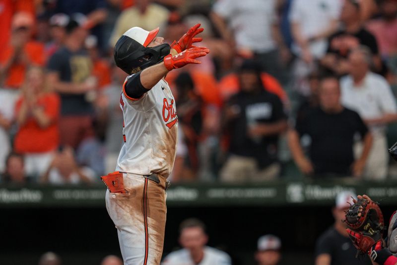 Jun 26, 2024; Baltimore, Maryland, USA; Baltimore Orioles shortstop Gunnar Henderson (2) celebrates after hitting a home run during the fifth inning against the Cleveland Guardians at Oriole Park at Camden Yards. Mandatory Credit: Reggie Hildred-USA TODAY Sports