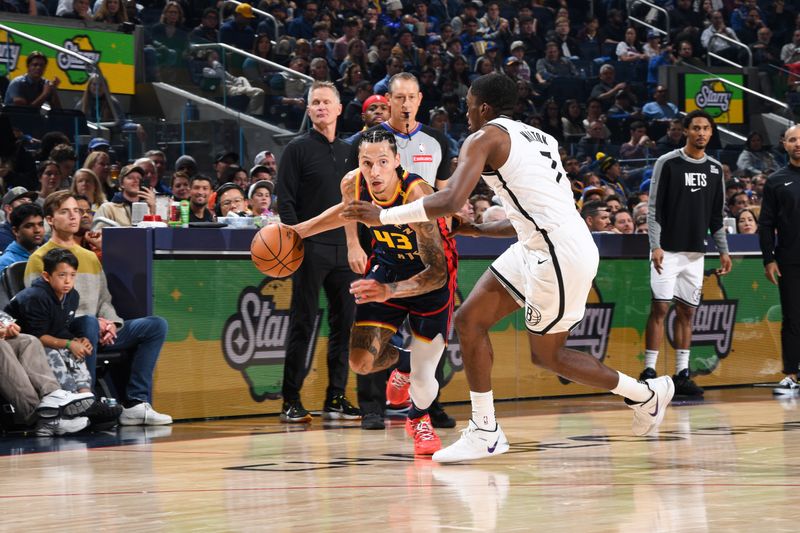 SAN FRANCISCO, CA - NOVEMBER 25: Lindy Waters III #43 of the Golden State Warriors handles the ball during the game against the Brooklyn Nets on November 25, 2024 at Chase Center in San Francisco, California. NOTE TO USER: User expressly acknowledges and agrees that, by downloading and or using this photograph, user is consenting to the terms and conditions of Getty Images License Agreement. Mandatory Copyright Notice: Copyright 2024 NBAE (Photo by Noah Graham/NBAE via Getty Images)