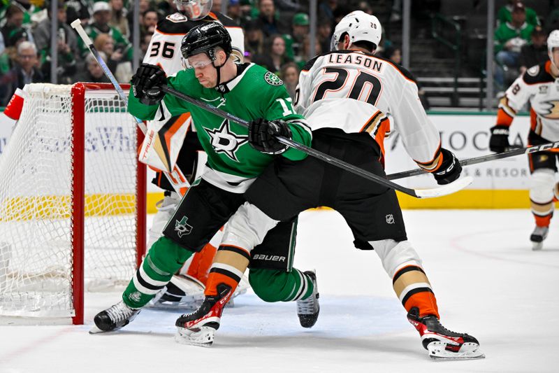 Jan 25, 2024; Dallas, Texas, USA; Dallas Stars center Radek Faksa (12) collies with Anaheim Ducks right wing Brett Leason (20) during the second period at the American Airlines Center. Mandatory Credit: Jerome Miron-USA TODAY Sports