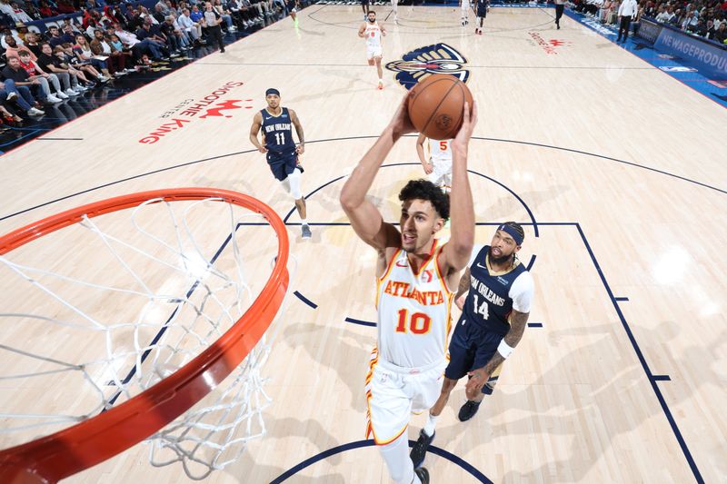 CHICAGO, IL - NOVEMBER 3: Zaccharie Risacher #10 of the Atlanta Hawks dunks the ball during the game against the New Orleans Pelicans on November 3, 2024 at United Center in Chicago, Illinois. NOTE TO USER: User expressly acknowledges and agrees that, by downloading and or using this photograph, User is consenting to the terms and conditions of the Getty Images License Agreement. Mandatory Copyright Notice: Copyright 2024 NBAE (Photo by Jeff Haynes/NBAE via Getty Images)