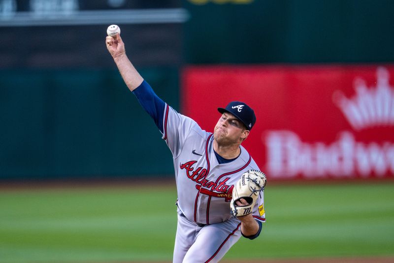 May 30, 2023; Oakland, California, USA;  Atlanta Braves starting pitcher Bryce Elder (55) delivers a pitch against the Oakland Athletics during the first inning at Oakland-Alameda County Coliseum. Mandatory Credit: Neville E. Guard-USA TODAY Sports