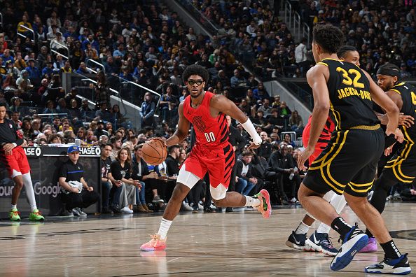 SAN FRANCISCO, CA - DECEMBER 23: Scoot Henderson #00 of the Portland Trail Blazers dribbles the ball during the game against the Golden State Warriors on December 23, 2023 at Chase Center in San Francisco, California. NOTE TO USER: User expressly acknowledges and agrees that, by downloading and or using this photograph, user is consenting to the terms and conditions of Getty Images License Agreement. Mandatory Copyright Notice: Copyright 2023 NBAE (Photo by Noah Graham/NBAE via Getty Images)