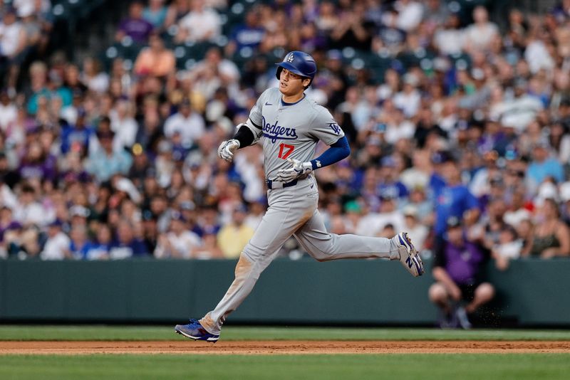 Jun 17, 2024; Denver, Colorado, USA; Los Angeles Dodgers designated hitter Shohei Ohtani (17) hits a double in the sixth inning against the Colorado Rockies at Coors Field. Mandatory Credit: Isaiah J. Downing-USA TODAY Sports