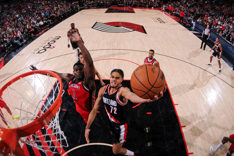 PORTLAND, OR - APRIL 9: Rayan Rupert #72 of the Portland Trail Blazers drives to the basket during the game against the New Orleans Pelicans on April 9, 2024 at the Moda Center Arena in Portland, Oregon. NOTE TO USER: User expressly acknowledges and agrees that, by downloading and or using this photograph, user is consenting to the terms and conditions of the Getty Images License Agreement. Mandatory Copyright Notice: Copyright 2024 NBAE (Photo by Cameron Browne/NBAE via Getty Images)