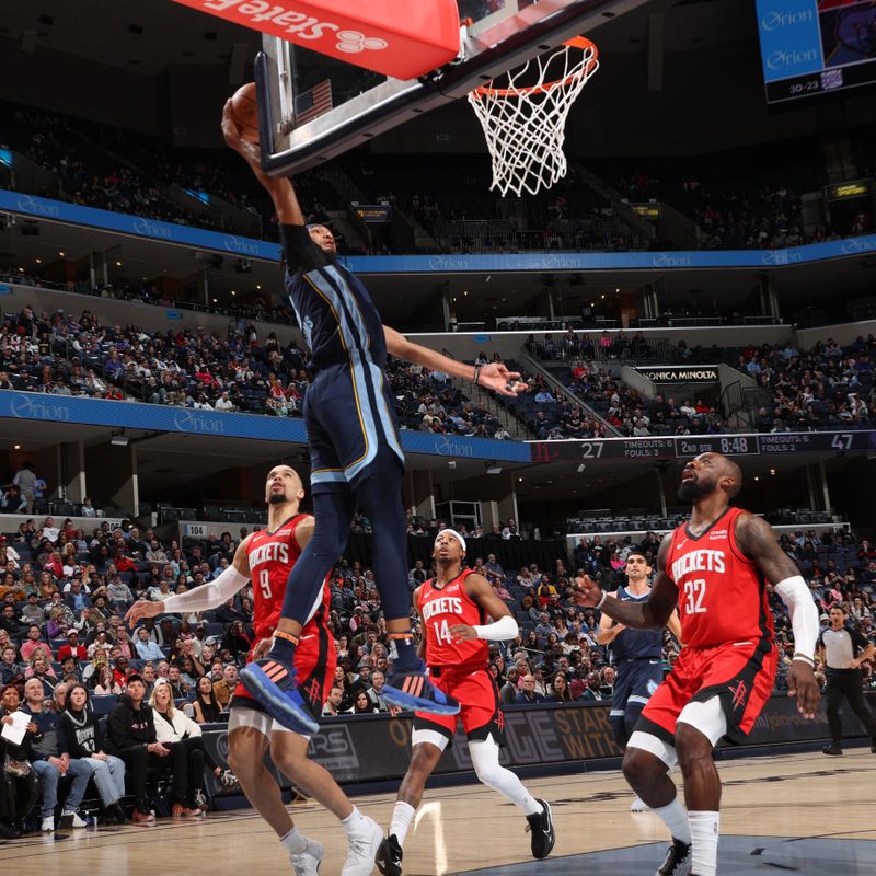 MEMPHIS, TN - FEBRUARY 14: Ziaire Williams #8 of the Memphis Grizzlies drives to the basket during the game against the Houston Rockets on February 14, 2024 at FedExForum in Memphis, Tennessee. NOTE TO USER: User expressly acknowledges and agrees that, by downloading and or using this photograph, User is consenting to the terms and conditions of the Getty Images License Agreement. Mandatory Copyright Notice: Copyright 2024 NBAE (Photo by Joe Murphy/NBAE via Getty Images)