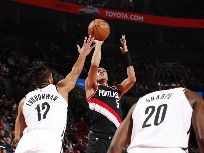 PORTLAND, OR - JANUARY 14: Dalano Banton #5 of the Portland Trail Blazers shoots the ball during the game against the Brooklyn Nets on January 14, 2025 at the Moda Center Arena in Portland, Oregon. NOTE TO USER: User expressly acknowledges and agrees that, by downloading and or using this photograph, user is consenting to the terms and conditions of the Getty Images License Agreement. Mandatory Copyright Notice: Copyright 2025 NBAE (Photo by Cameron Browne/NBAE via Getty Images)