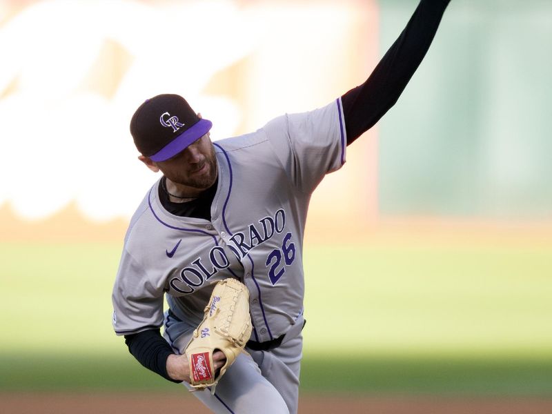 May 22, 2024; Oakland, California, USA; Colorado Rockies starting pitcher Austin Gomber (26) delivers a pitch against the Oakland Athletics during the first inning at Oakland-Alameda County Coliseum. Mandatory Credit: D. Ross Cameron-USA TODAY Sports