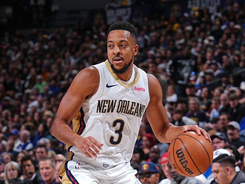 DENVER, CO - JANUARY 12: CJ McCollum #3 of the New Orleans Pelicans dribbles the ball during the game against the Denver Nuggets on January 12, 2024 at the Ball Arena in Denver, Colorado. NOTE TO USER: User expressly acknowledges and agrees that, by downloading and/or using this Photograph, user is consenting to the terms and conditions of the Getty Images License Agreement. Mandatory Copyright Notice: Copyright 2024 NBAE (Photo by Garrett Ellwood/NBAE via Getty Images)