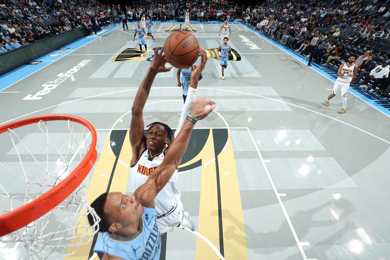 MEMPHIS, TN - NOVEMBER 19: Peyton Watson #8 of the Denver Nuggets drives to the basket during the game against the Memphis Grizzlies during the Emirates NBA Cup game on November 19, 2024 at FedExForum in Memphis, Tennessee. NOTE TO USER: User expressly acknowledges and agrees that, by downloading and or using this photograph, User is consenting to the terms and conditions of the Getty Images License Agreement. Mandatory Copyright Notice: Copyright 2024 NBAE (Photo by Joe Murphy/NBAE via Getty Images)