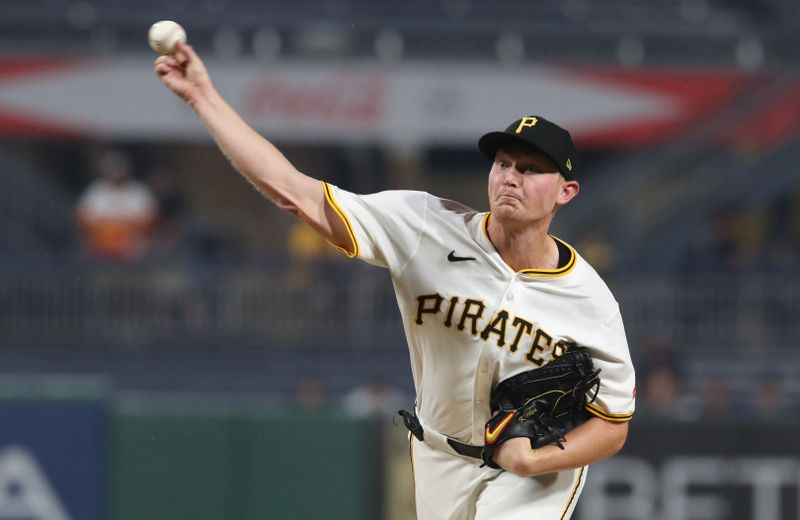 Jun 5, 2025; Pittsburgh, Pennsylvania, USA; Pittsburgh Pirates starting pitcher Mitch Keller (23) delivers a pitch against the Houston Astros during the first inning at PNC Park. Mandatory Credit: Charles LeClaire-Imagn Images