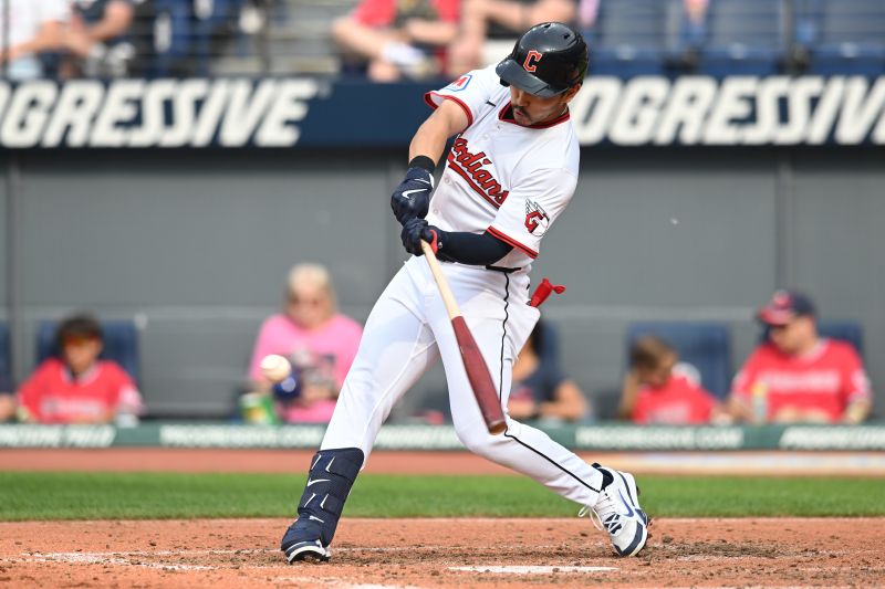 Jun 7, 2025; Cleveland, Ohio, USA; Cleveland Guardians left fielder Steven Kwan (38) hits a single during the fifth inning against the Houston Astros at Progressive Field. Mandatory Credit: Ken Blaze-Imagn Images