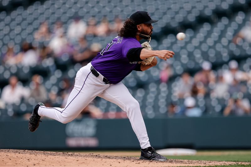 Aug 29, 2024; Denver, Colorado, USA; Colorado Rockies relief pitcher Justin Lawrence (61) pitches in the ninth inning against the Miami Marlins at Coors Field. Mandatory Credit: Isaiah J. Downing-USA TODAY Sports