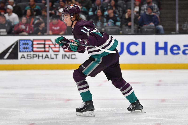 Dec 23, 2023; Anaheim, California, USA; Anaheim Ducks center Trevor Zegras (11) in action against the Seattle Kraken during the second period at Honda Center. Mandatory Credit: Gary A. Vasquez-USA TODAY Sports