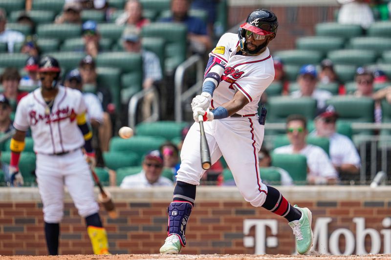 Aug 2, 2023; Cumberland, Georgia, USA; Atlanta Braves center fielder Michael Harris II (23) hits a double against the Los Angeles Angels during the sixth inning at Truist Park. Mandatory Credit: Dale Zanine-USA TODAY Sports