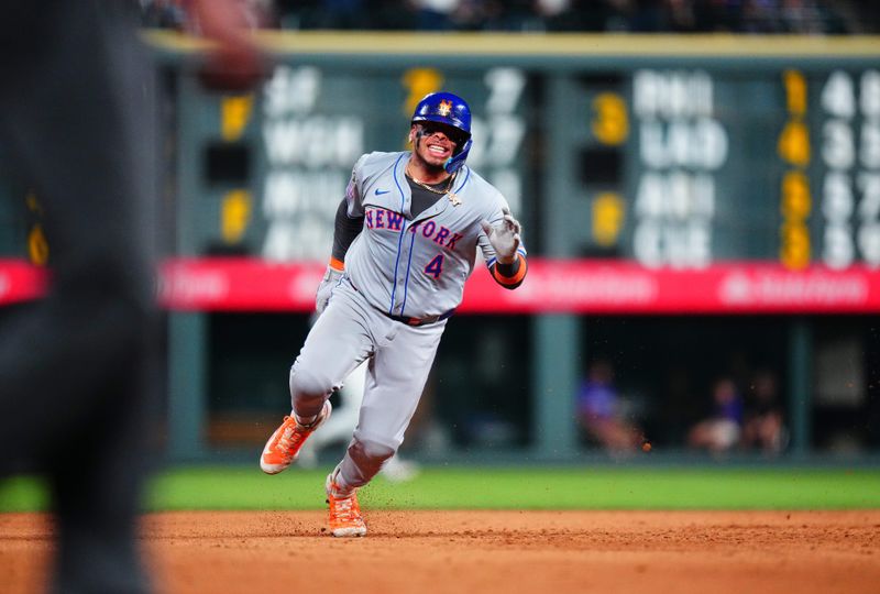 Aug 7, 2024; Denver, Colorado, USA; New York Mets catcher Francisco Alvarez (4) runs out a triple in the ninth inning against the Colorado Rockies at Coors Field. Mandatory Credit: Ron Chenoy-USA TODAY Sports