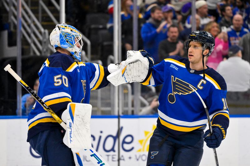Nov 3, 2025; St. Louis, Missouri, USA; St. Louis Blues center Brayden Schenn (10) celebrates with goaltender Jordan Binnington (50) after the Blues defeated the Edmonton Oilers at Enterprise Center. Mandatory Credit: Jeff Curry-Imagn Images