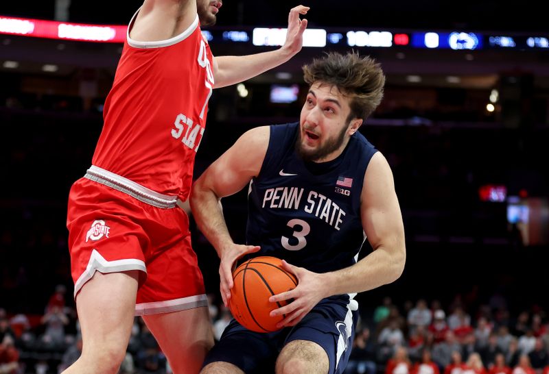 Jan 26, 2026; Columbus, Ohio, USA; Penn State Nittany Lions forward Ivan Juric (3) goes to the basket as Ohio State Buckeyes center Ivan Njegovan (7) defends during the first half at Value City Arena. Mandatory Credit: Joseph Maiorana-Imagn Images