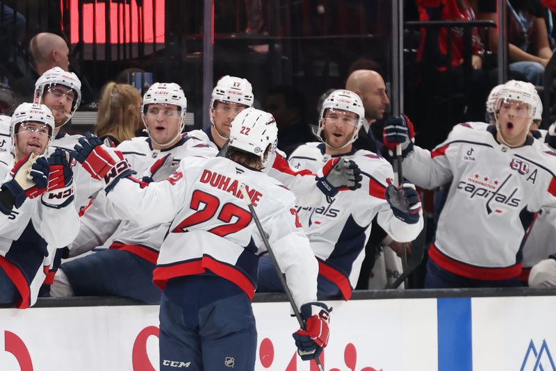 Nov 18, 2024; Salt Lake City, Utah, USA; The Washington Capitals celebrate a goal by right wing Brandon Duhaime (22) against the Utah Hockey Club during the third period at Delta Center. Mandatory Credit: Rob Gray-Imagn Images