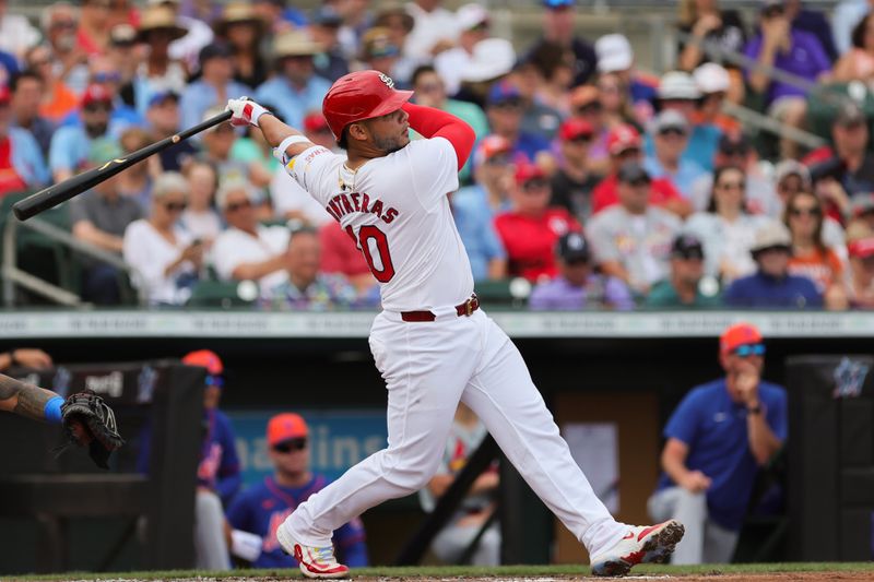 Mar 1, 2024; Jupiter, Florida, USA; St. Louis Cardinals catcher Wilson Contreras (40) swings during his at-bat against the New York Mets in the third inning at Roger Dean Chevrolet Stadium. Mandatory Credit: Sam Navarro-USA TODAY Sports