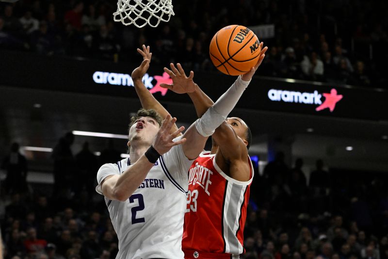 Jan 27, 2024; Evanston, Illinois, USA; Northwestern Wildcats forward Nick Martinelli (2) shoots against Ohio State Buckeyes forward Zed Key (23) during the second half  at Welsh-Ryan Arena. Mandatory Credit: Matt Marton-USA TODAY Sports