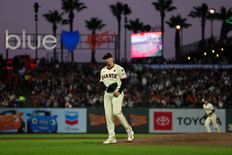 Aug 12, 2024; San Francisco, California, USA; San Francisco Giants pitcher Blake Snell (7) celebrates after striking out Atlanta Braves third base Austin Riley (27) during the sixth inning at Oracle Park. Mandatory Credit: Sergio Estrada-USA TODAY Sports