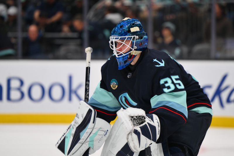 Dec 12, 2023; Seattle, Washington, USA; Seattle Kraken goaltender Joey Daccord (35) defends the goal during the third period against the Florida Panthers at Climate Pledge Arena. Mandatory Credit: Steven Bisig-USA TODAY Sports