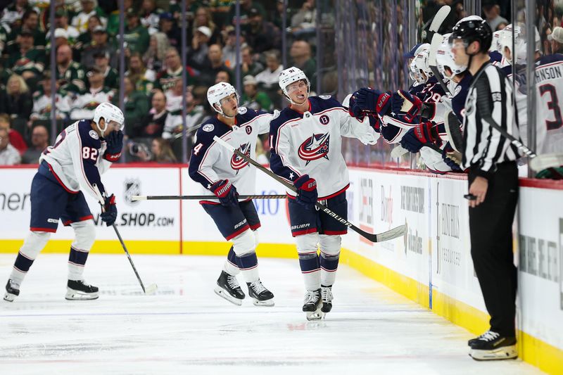 Oct 10, 2024; Saint Paul, Minnesota, USA; Columbus Blue Jackets left wing James van Riemsdyk (21) celebrates his goal with teammates during the second period against the Minnesota Wild at Xcel Energy Center. Mandatory Credit: Matt Krohn-Imagn Images