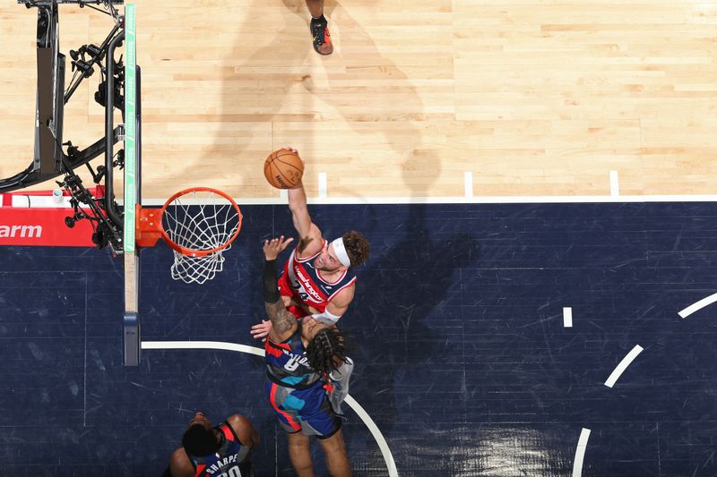 WASHINGTON, DC -? MARCH 27: Corey Kispert #24 of the Washington Wizards dunks the ball during the game against the Brooklyn Nets on March 27, 2024 at Capital One Arena in Washington, DC. NOTE TO USER: User expressly acknowledges and agrees that, by downloading and or using this Photograph, user is consenting to the terms and conditions of the Getty Images License Agreement. Mandatory Copyright Notice: Copyright 2024 NBAE (Photo by Stephen Gosling/NBAE via Getty Images)