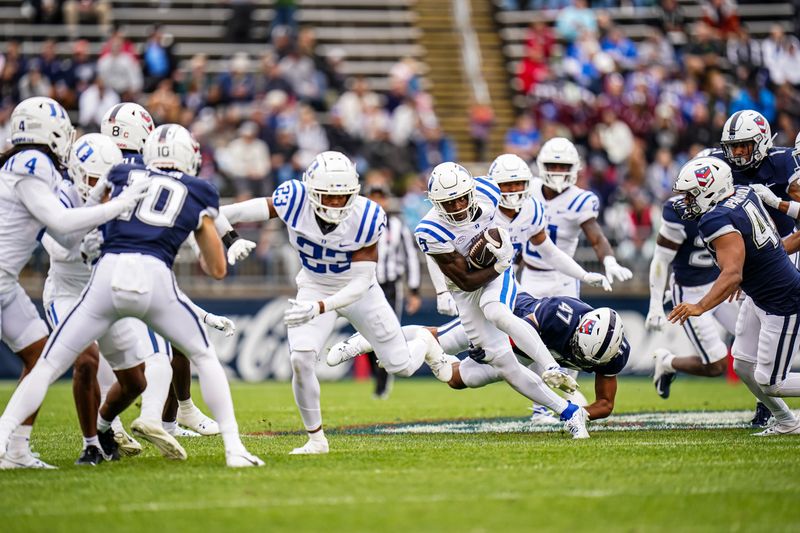 Sep 23, 2023; East Hartford, Connecticut, USA; Duke Blue Devils wide receiver Jalon Calhoun (5) runs the ball against the UConn Huskies in the first quarter at Rentschler Field at Pratt & Whitney Stadium. Mandatory Credit: David Butler II-USA TODAY Sports